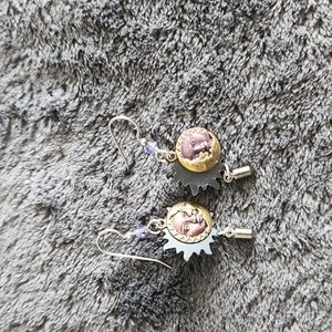 Metal sun and moon dangle earrings
